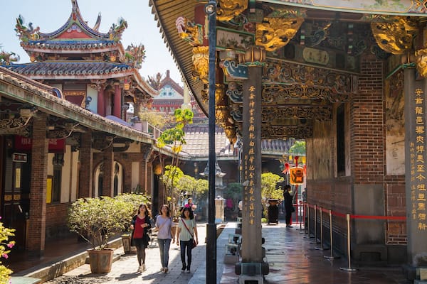 Baoan Temple which includes a temple or place of worship and heritage elements as well as a small group of people