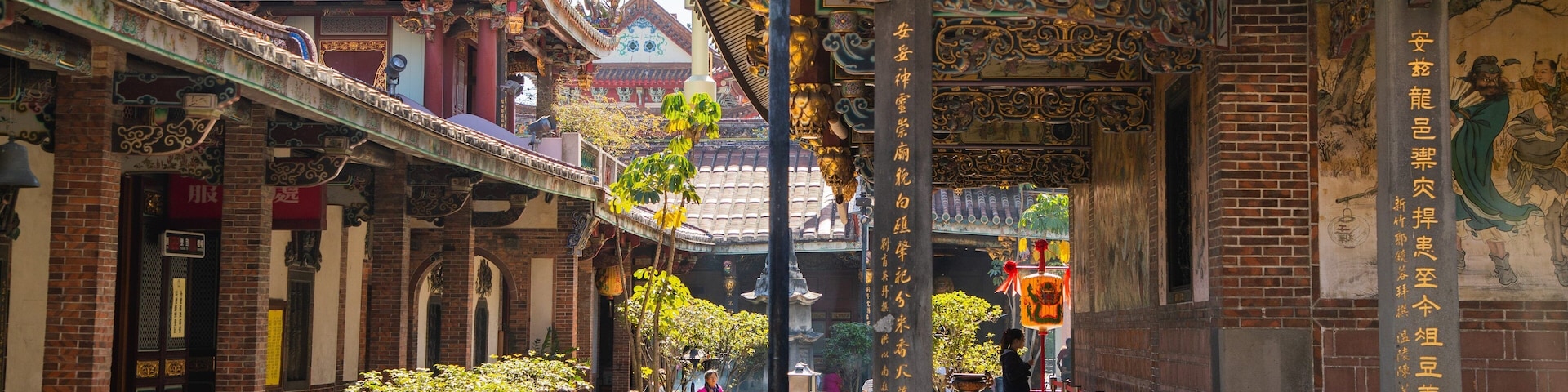 Baoan Temple which includes a temple or place of worship and heritage elements as well as a small group of people