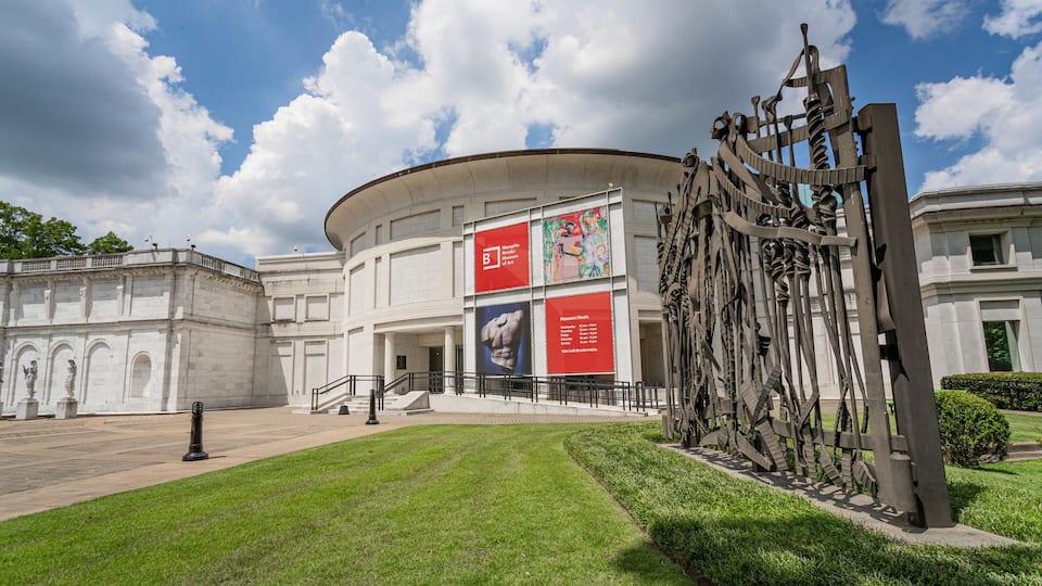 Memphis Brooks Museum of Art featuring signage and outdoor art