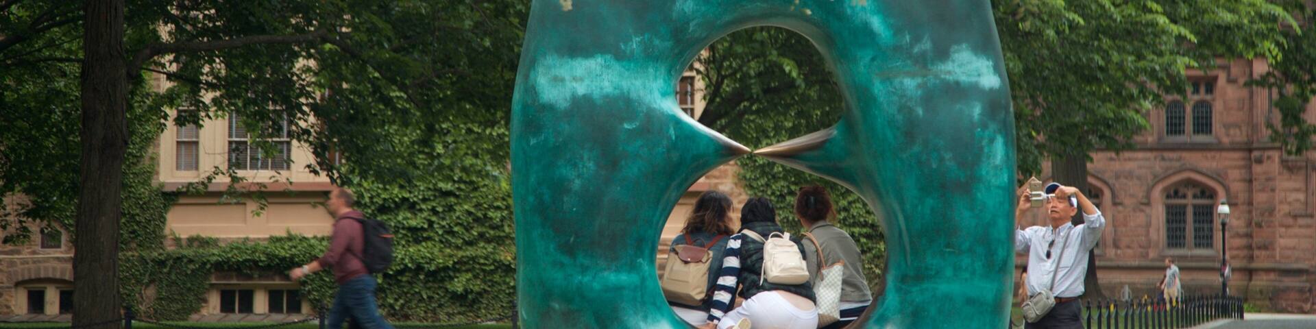 Princeton University showing outdoor art, street scenes and a garden