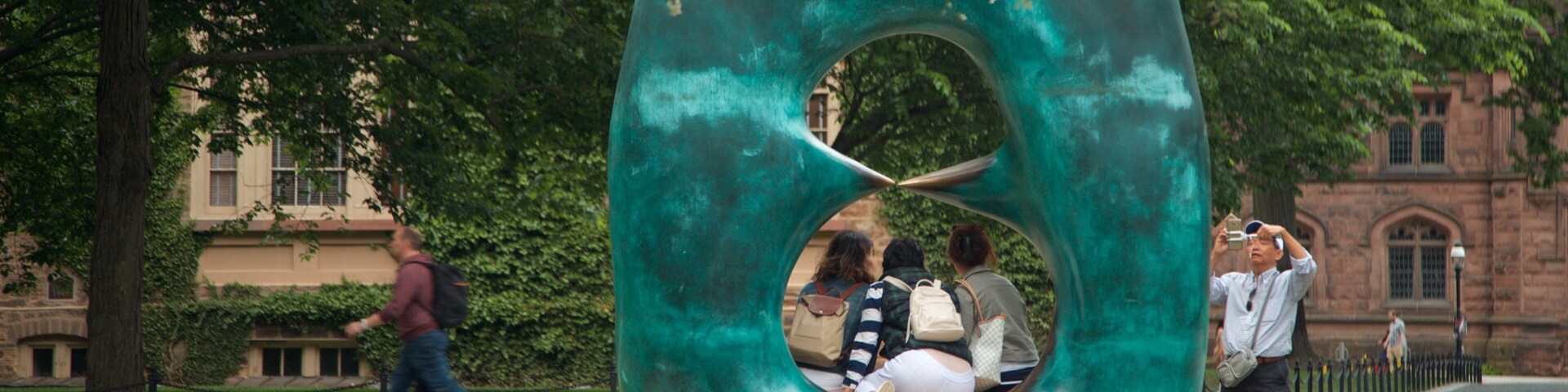 Princeton University showing outdoor art, street scenes and a garden