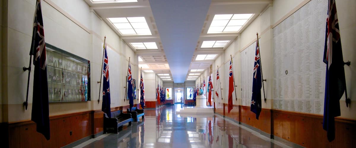 Auckland War Memorial Museum featuring a memorial and interior views
