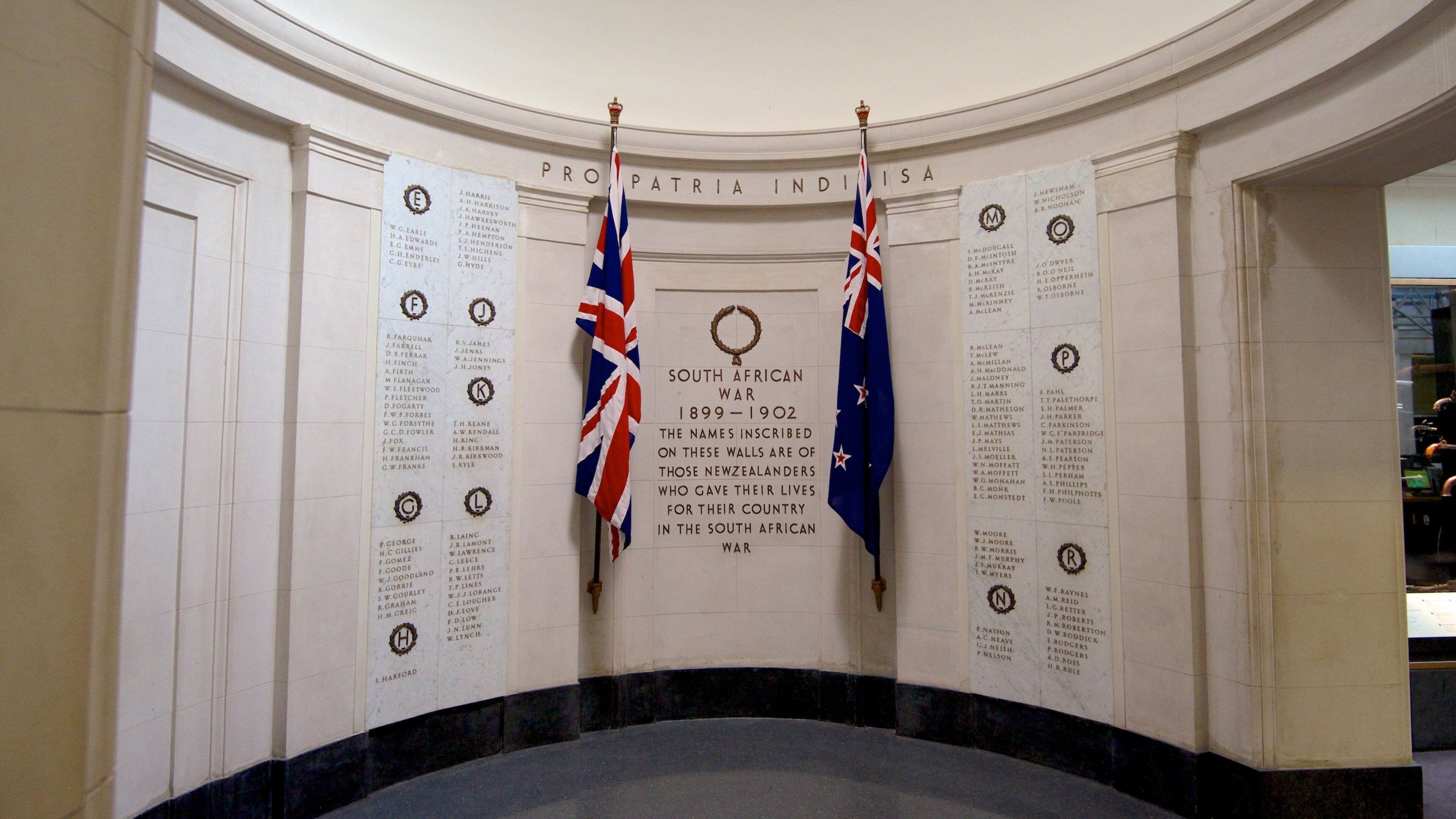 Auckland War Memorial Museum which includes signage, military items and interior views