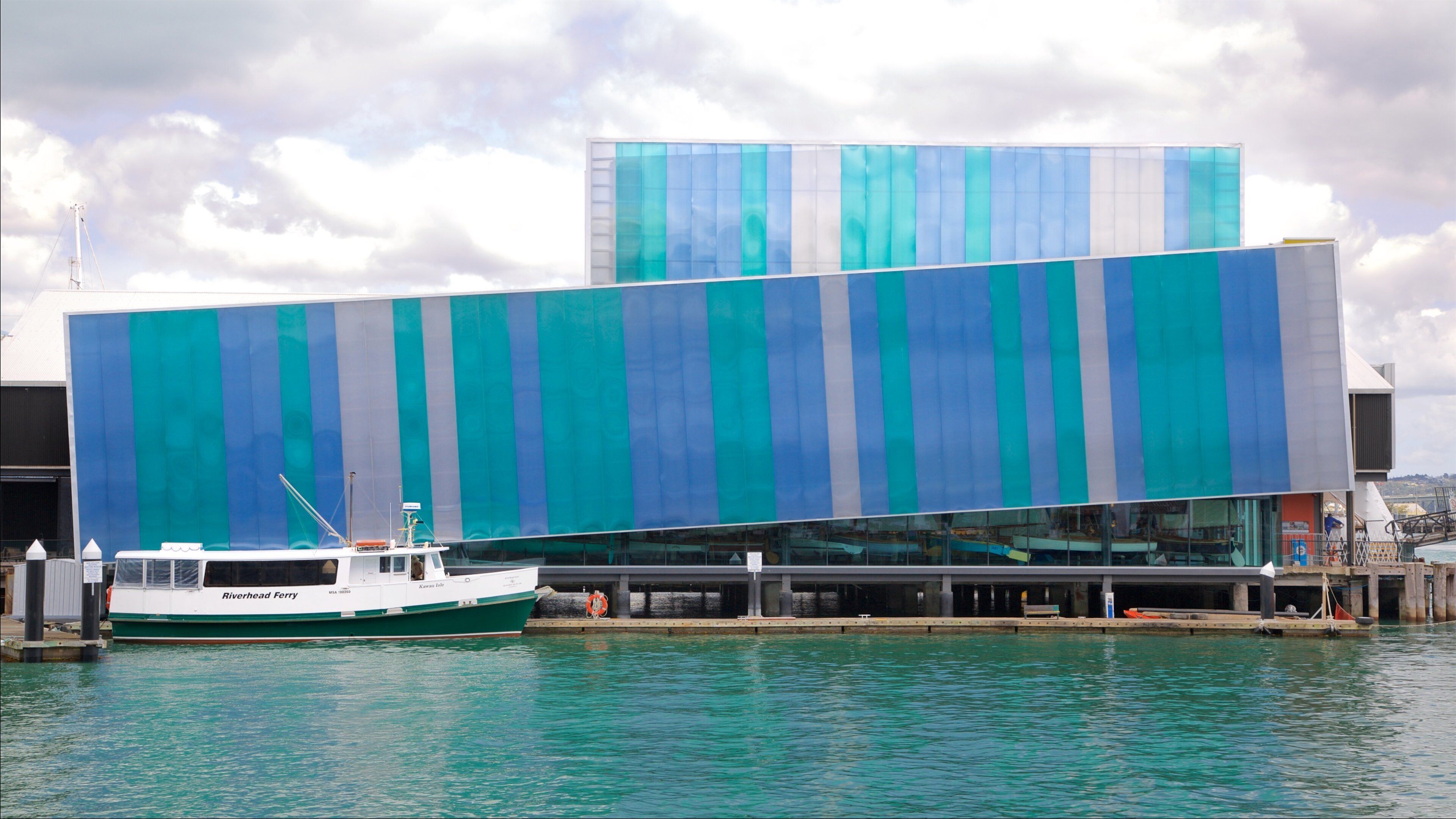 New Zealand National Maritime Museum which includes modern architecture and a bay or harbour