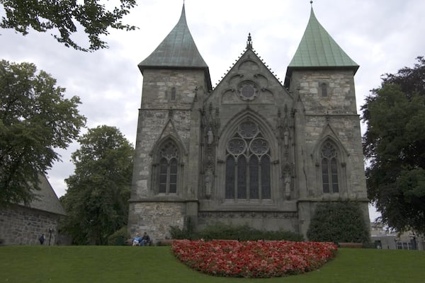 Stavanger Cathedral showing a church or cathedral, religious elements and flowers