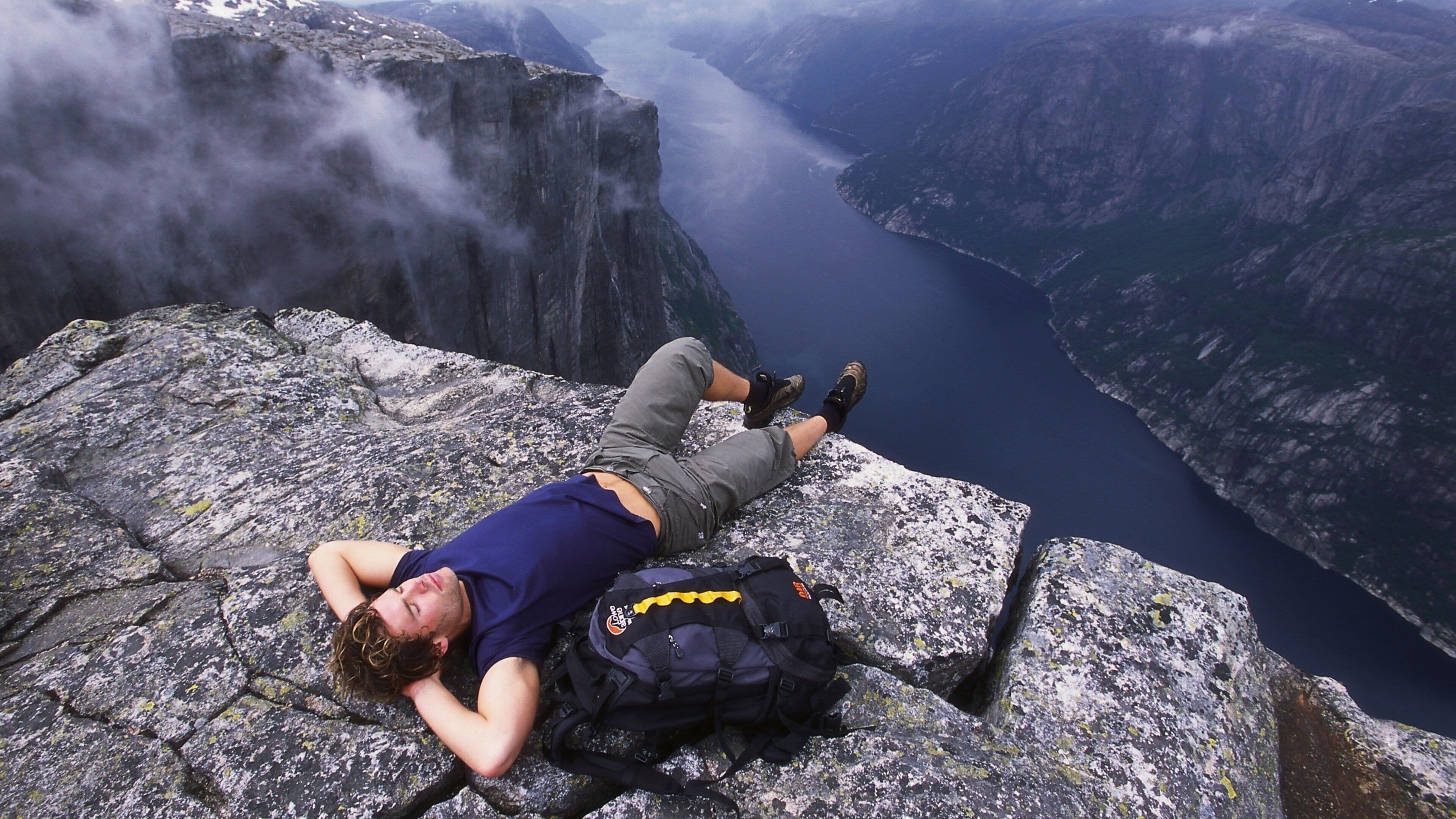 Kjerag showing mountains, tranquil scenes and hiking or walking