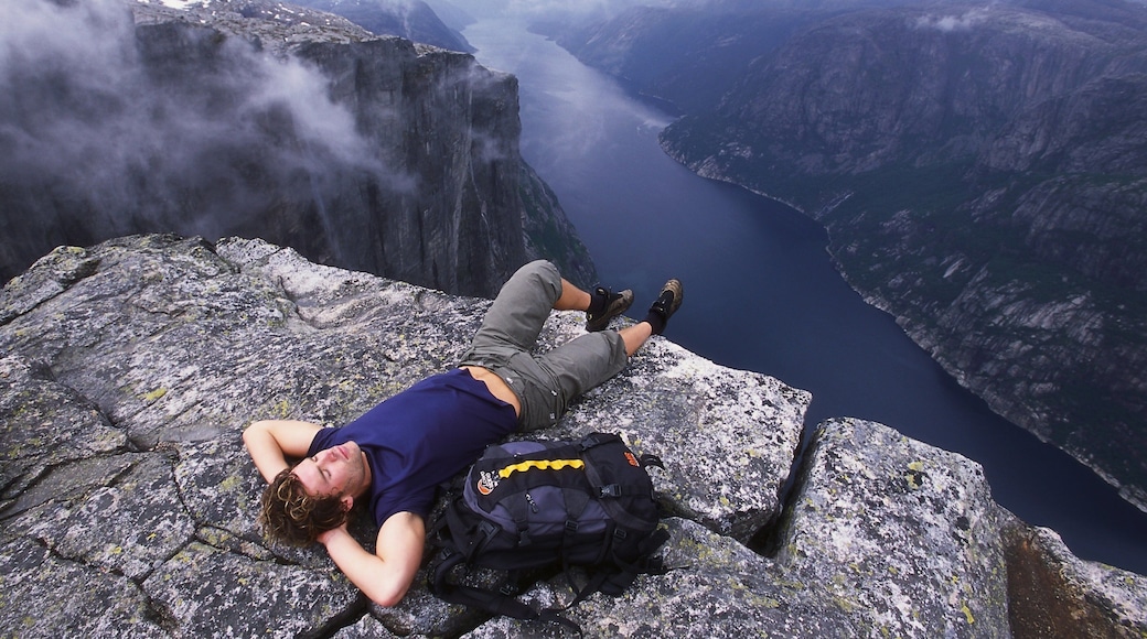 Kjerag showing mountains, tranquil scenes and hiking or walking