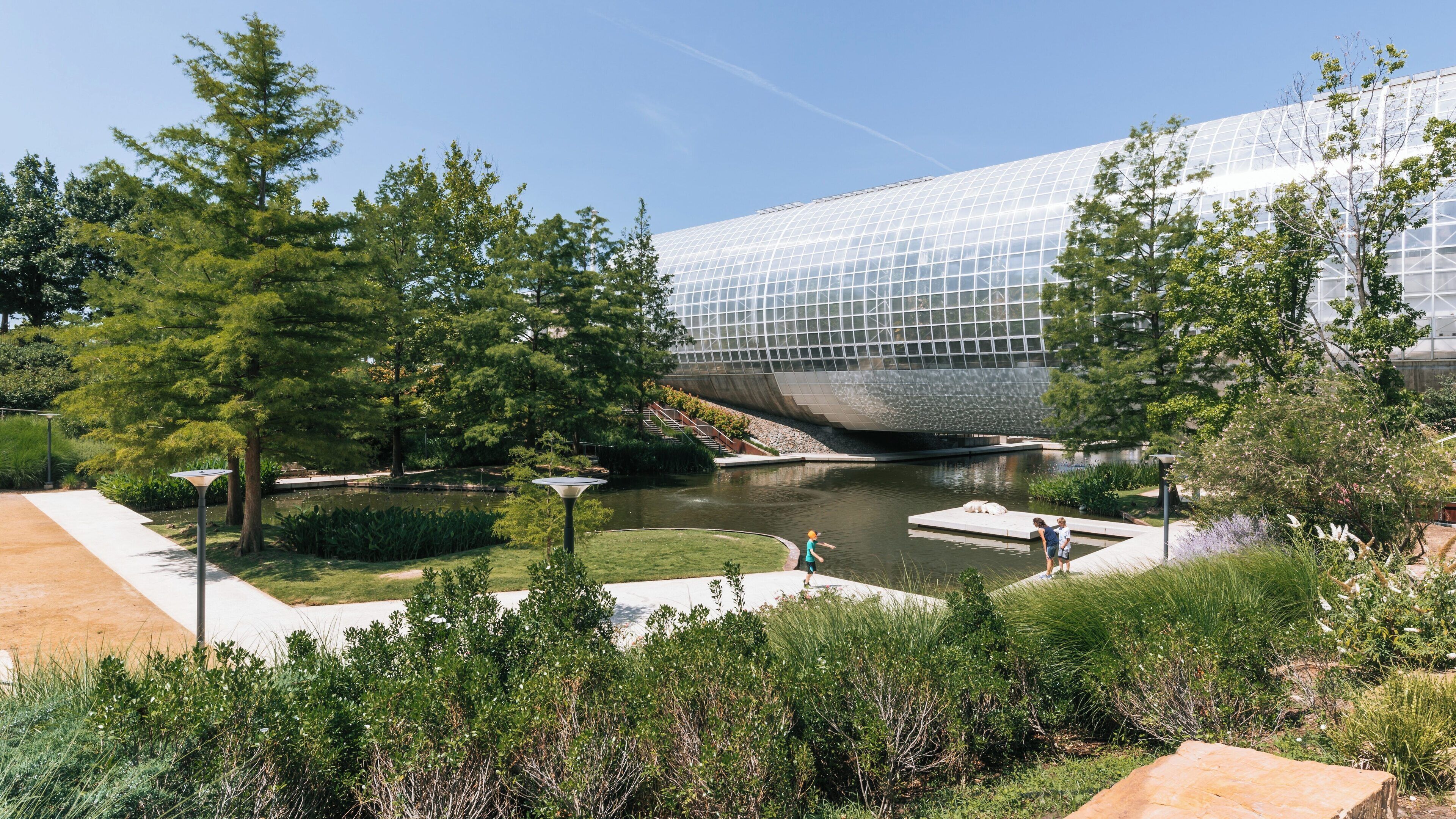 Visiting Myriad Botanical Gardens in Downtown Oklahoma City showcases nature and modern design on a sunny day