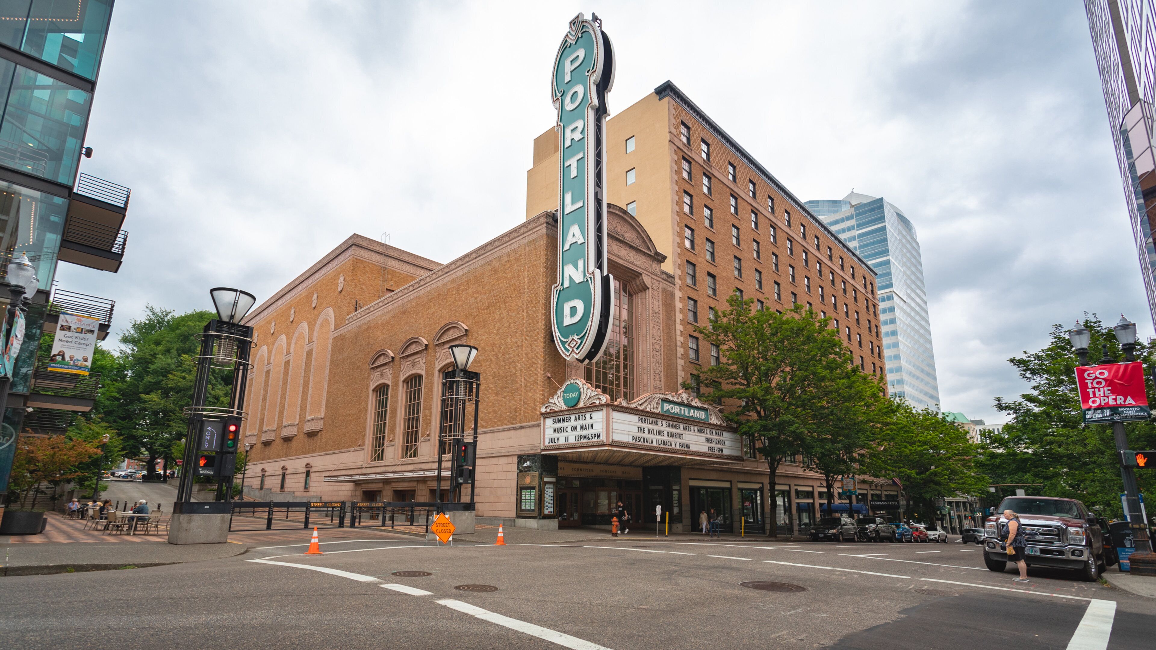 Arlene Schnitzer Concert Hall featuring signage and a city