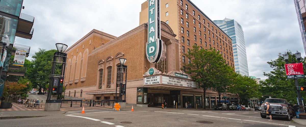 Arlene Schnitzer Concert Hall featuring signage and a city