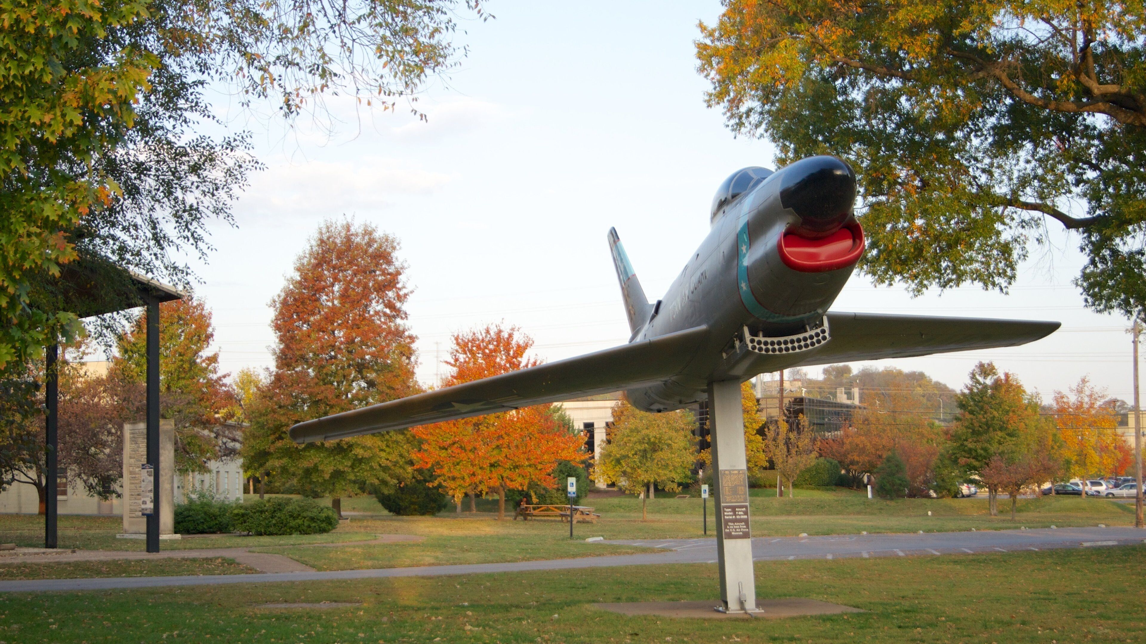 Historic Parthenon replica in Nashville, Tennessee surrounded by vibrant trees and clear sky