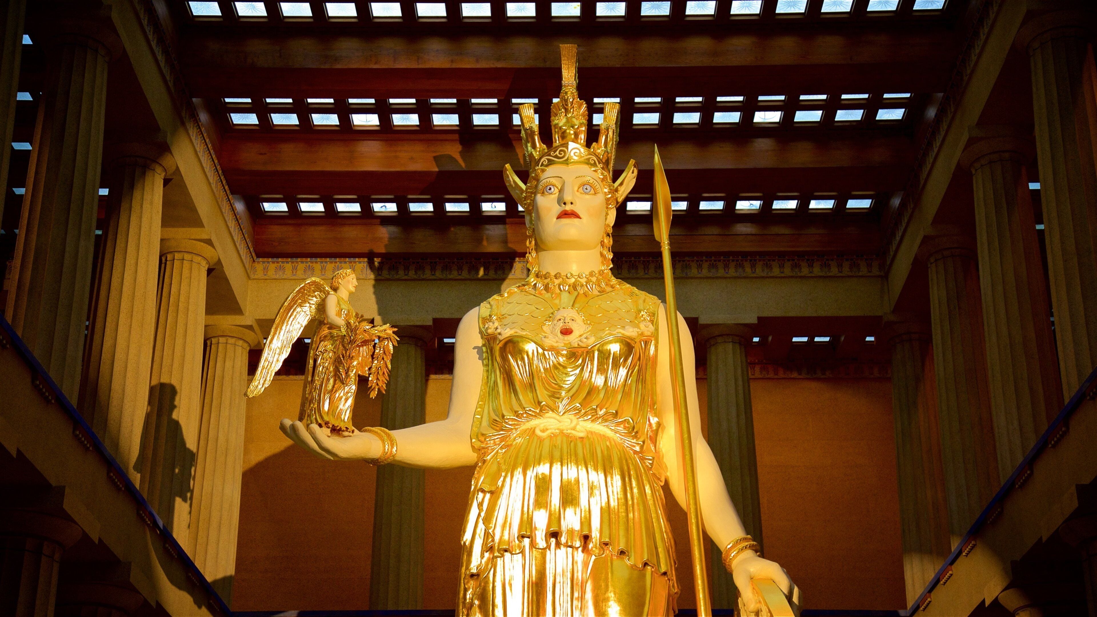 Parthenon som inkluderer statue eller skulptur og innendørs