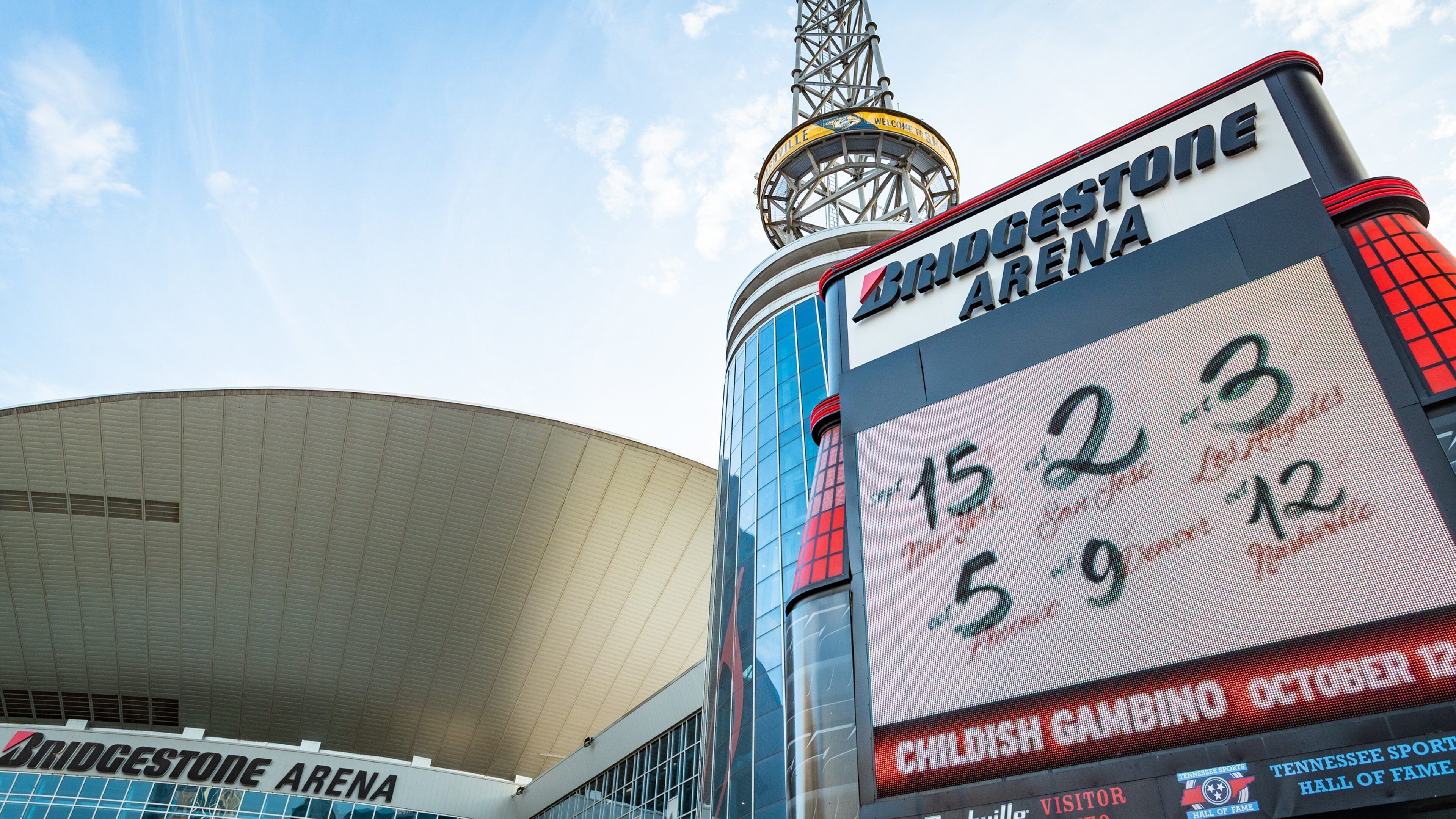 Bridgestone Arena which includes signage and modern architecture