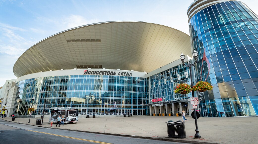 Bridgestone Arena featuring modern architecture, a city and signage