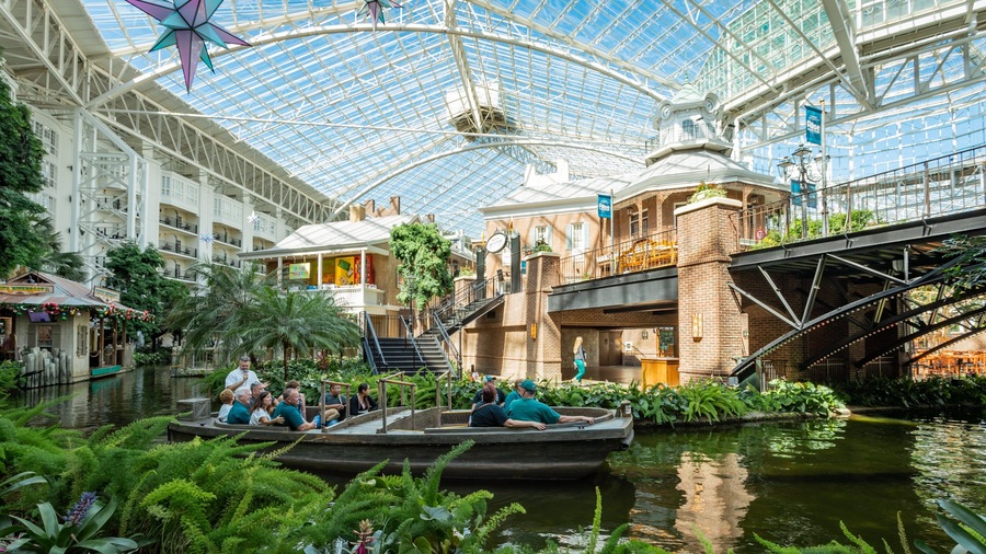 Opryland Hotel Gardens which includes a river or creek, interior views and boating