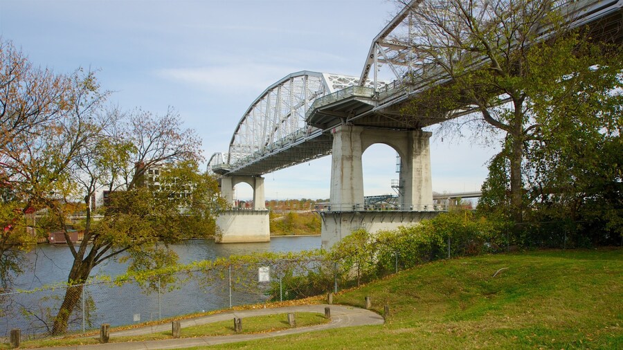 Riverfront Park in Nashville offers scenic views of the bridge and calm waters for visitors enjoying nature and strolling on pathways