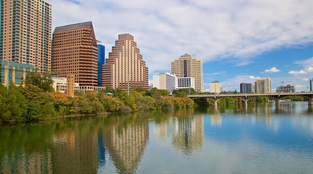 Ann W. Richards Congress Avenue Bridge showing a city, a bridge and a river or creek