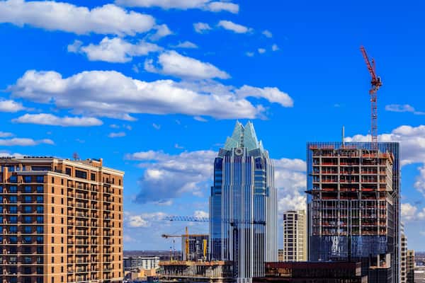 Modern office buildings of tech firms downtown with the famous Frost Bank Tower in the background in Austin, Texas, USA