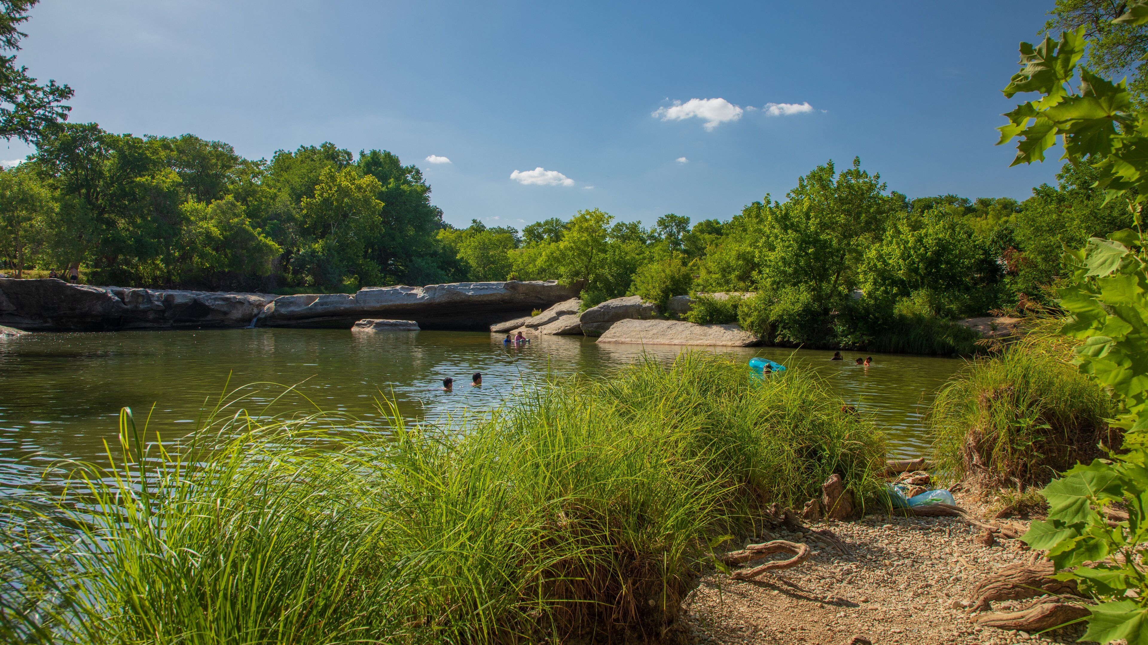 McKinney Falls State Park showing a lake or waterhole and swimming
