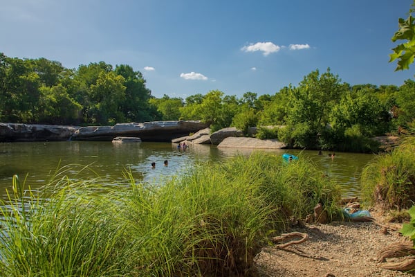 McKinney Falls State Park showing a lake or waterhole and swimming