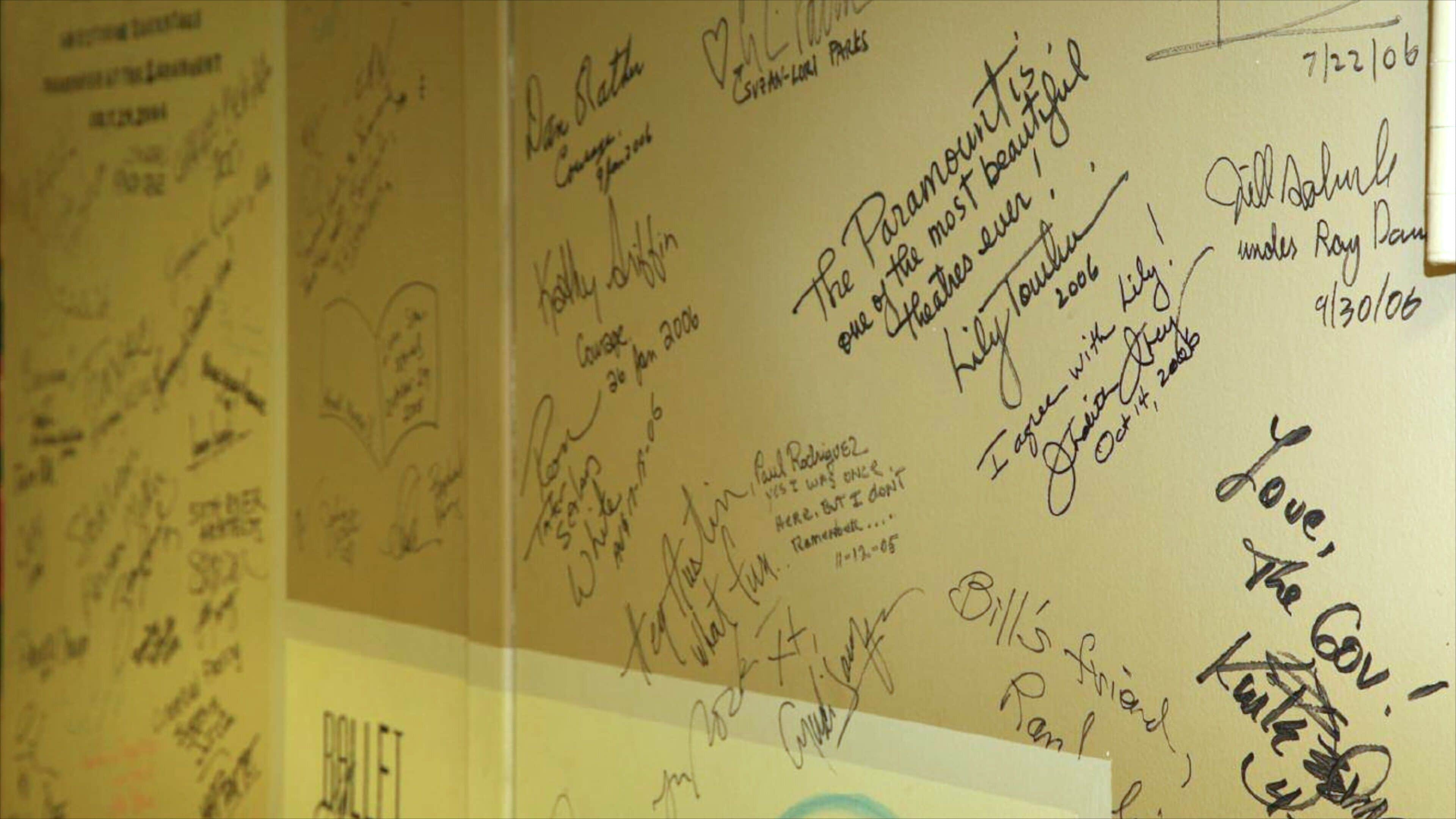 Signatures on display inside Paramount Theatre in Austin, Texas capture memories and events from various performances and visitors over the years