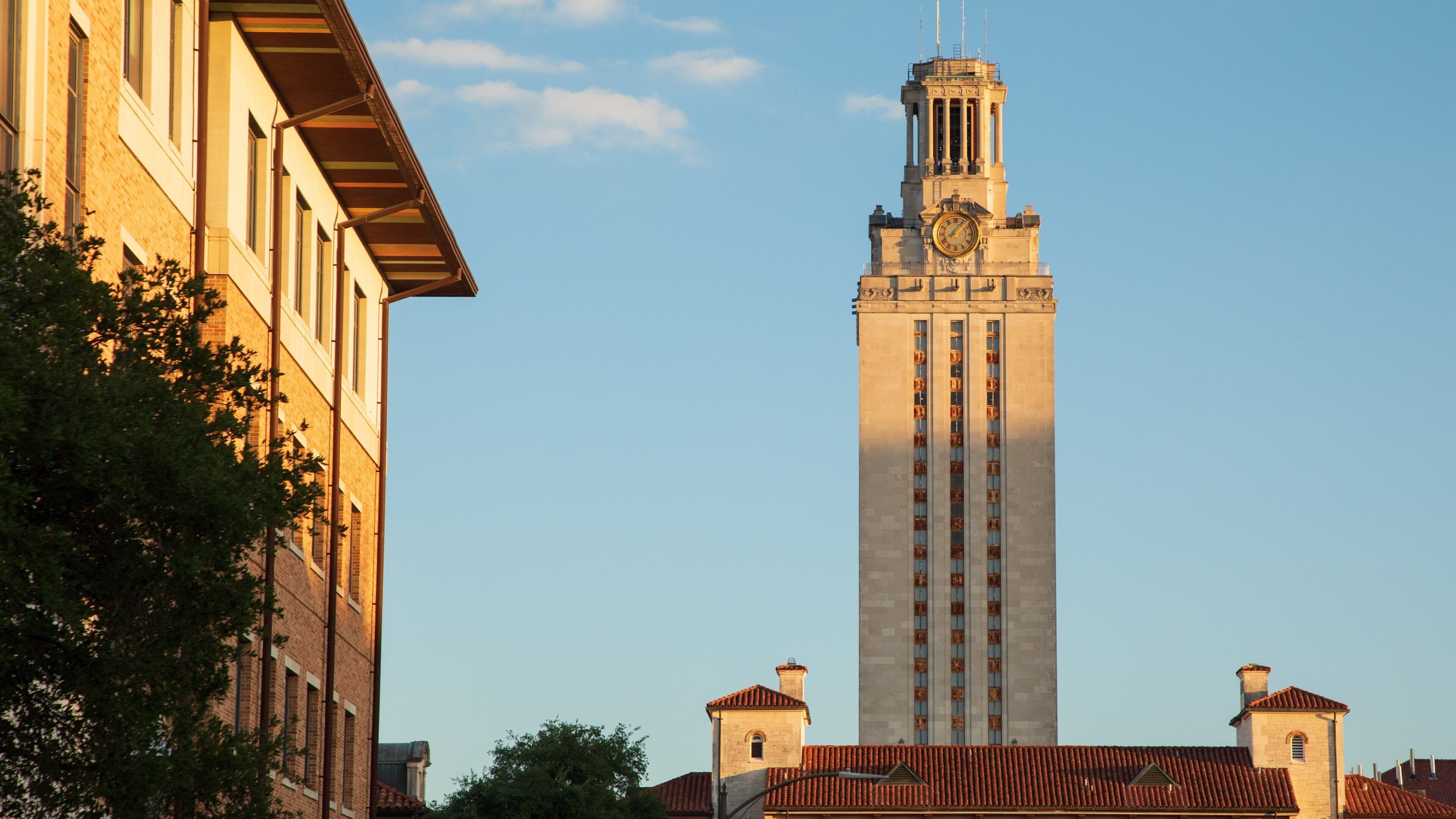 University of Texas at Austin which includes a sunset and heritage architecture