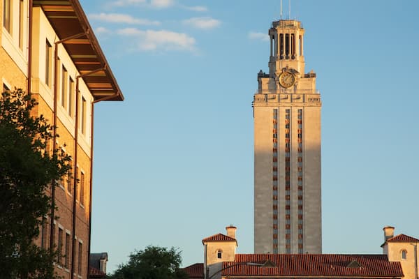 University of Texas at Austin which includes a sunset and heritage architecture