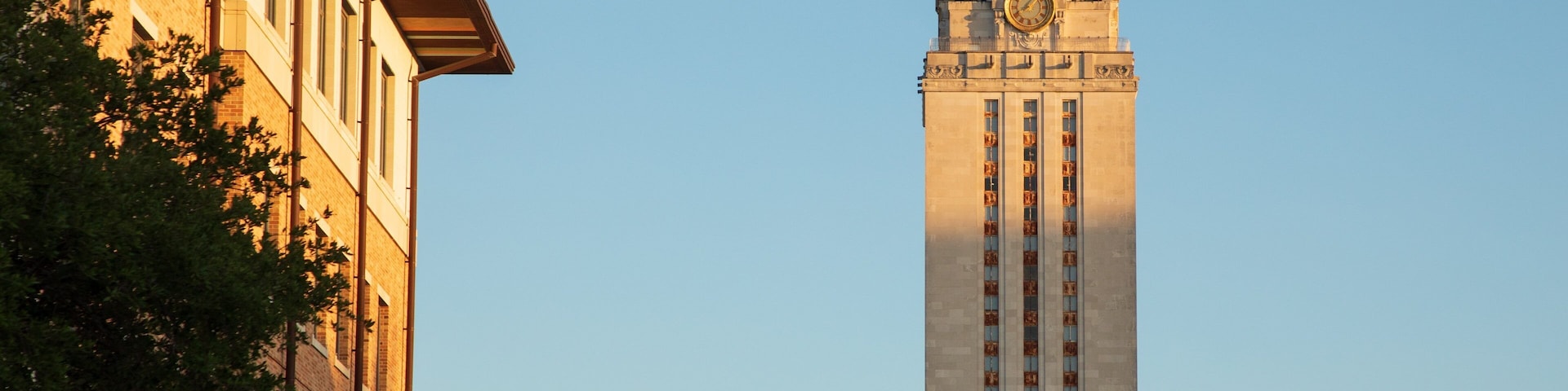 University of Texas at Austin which includes a sunset and heritage architecture
