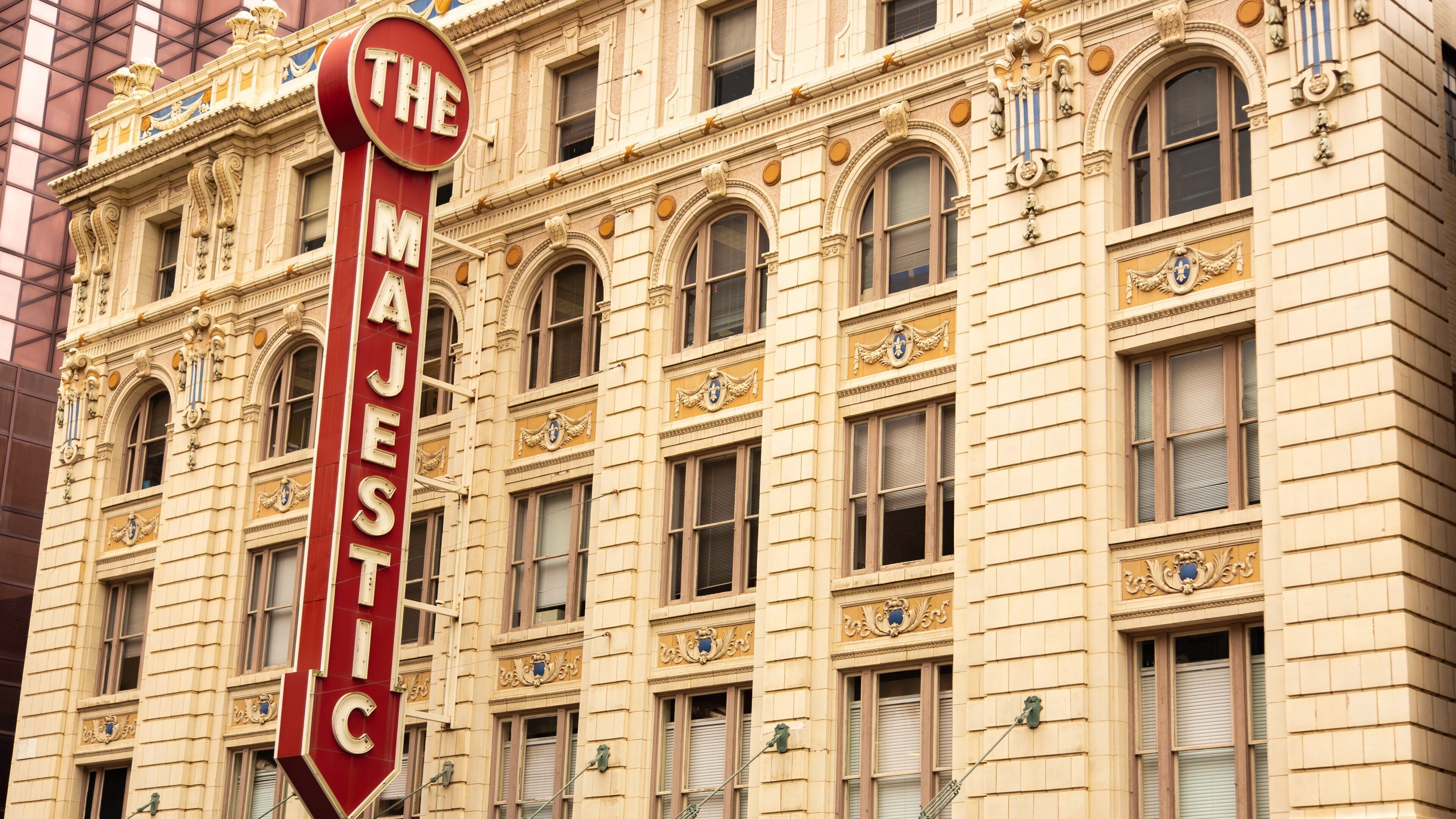 Majestic Theater featuring a city, heritage architecture and signage