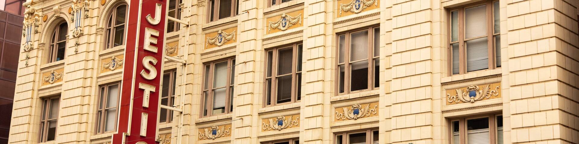 Majestic Theater featuring a city, heritage architecture and signage