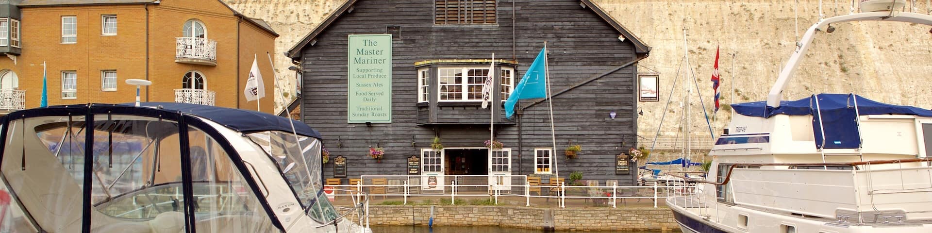 Brighton Marina featuring a marina, a house and boating