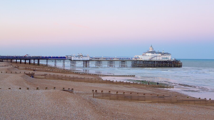 Eastbourne Pier showing a sunset and general coastal views