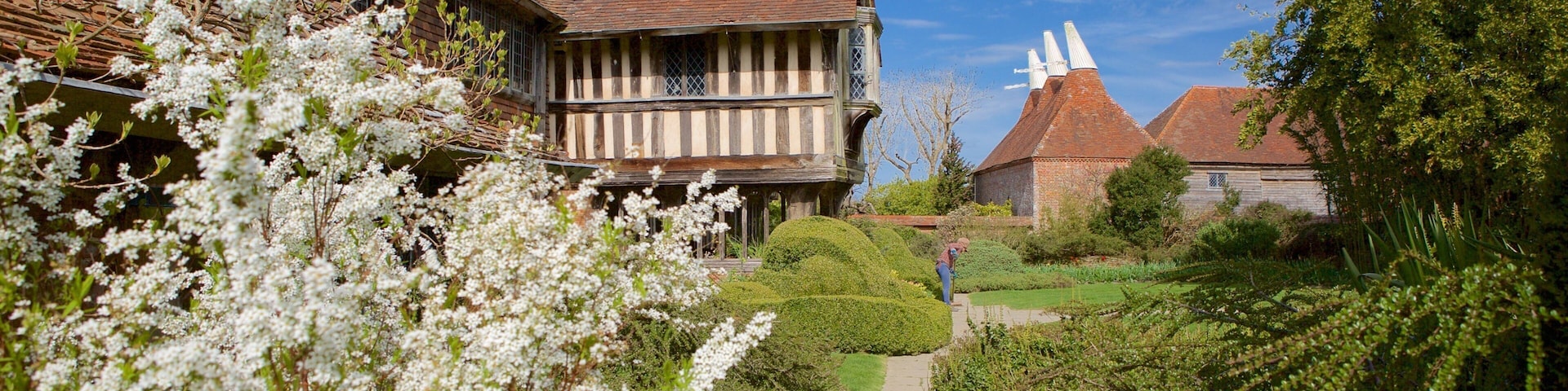 Great Dixter House and Gardens featuring heritage elements and a garden
