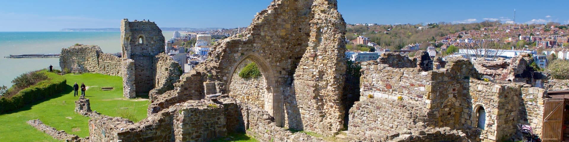 Hastings Castle featuring a ruin, heritage elements and general coastal views