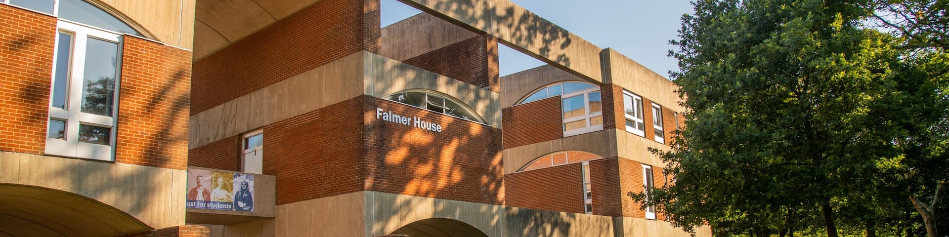 A modern building with the sign "Palmer House" on the side.