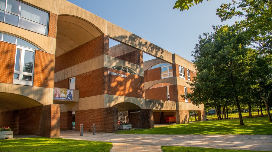 A modern building with the sign "Palmer House" on the side.
