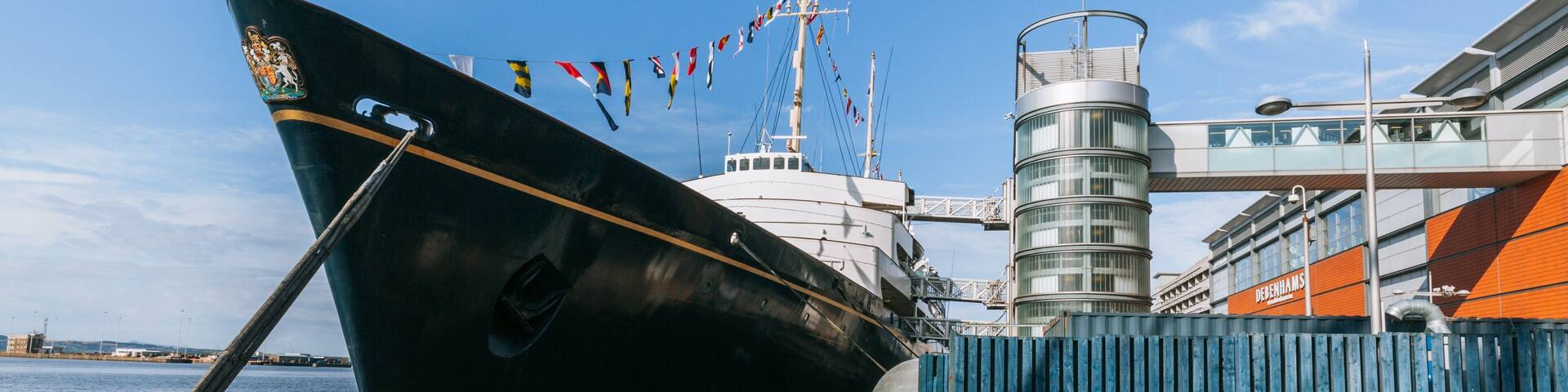 Royal Yacht Britannia featuring a marina