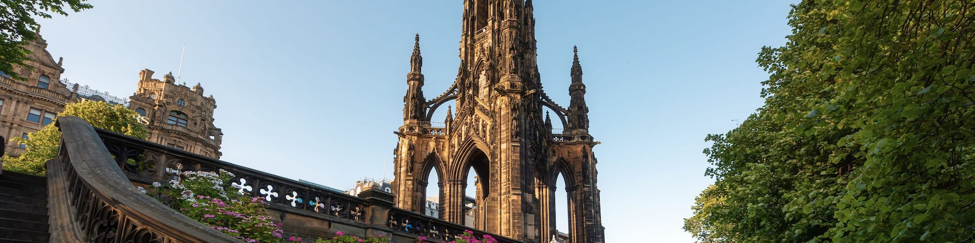 Scott monument in West Princes Street Gardens, Edinburgh during clear blue sky day