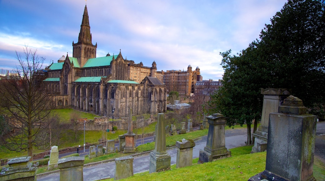 Glasgow Necropolis showing heritage architecture, a church or cathedral and a cemetery