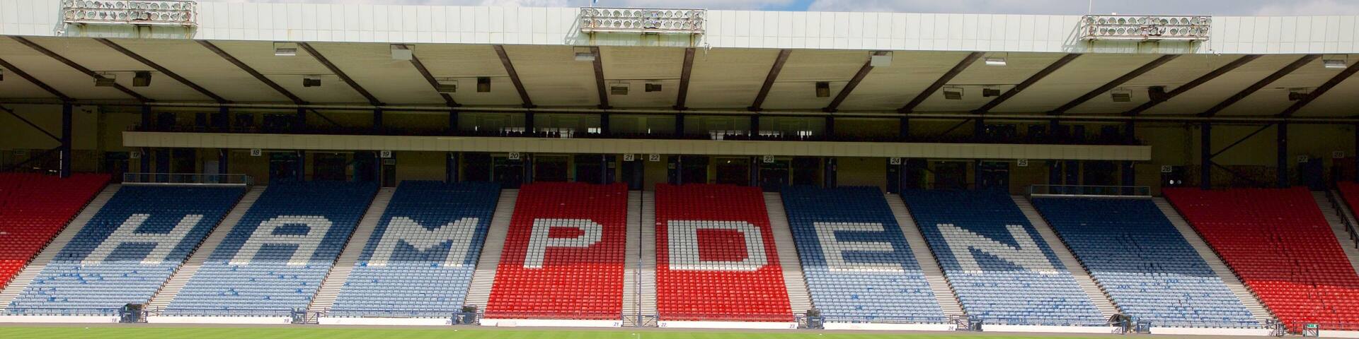 A stadium with sections labeled "HAMPEEN" and "DEN" in blue and red respectively.