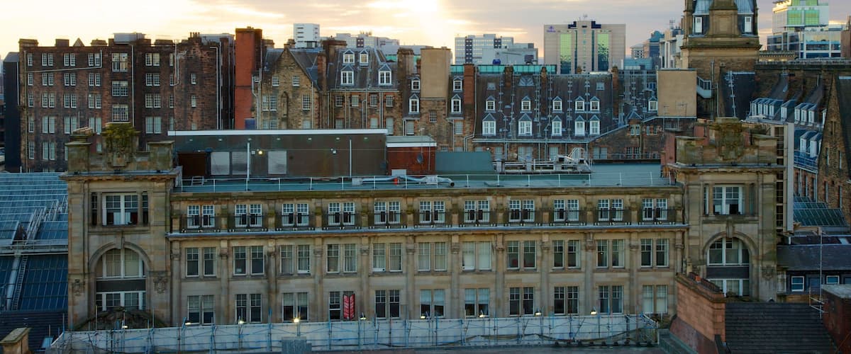 The Lighthouse featuring a sunset, heritage architecture and a city
