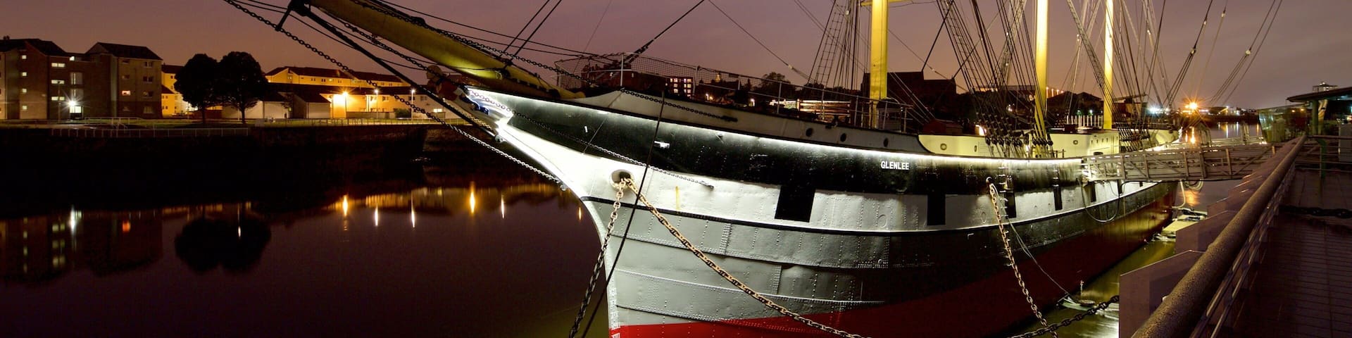 Tall Ship at Glasgow Harbour showing boating and a sunset