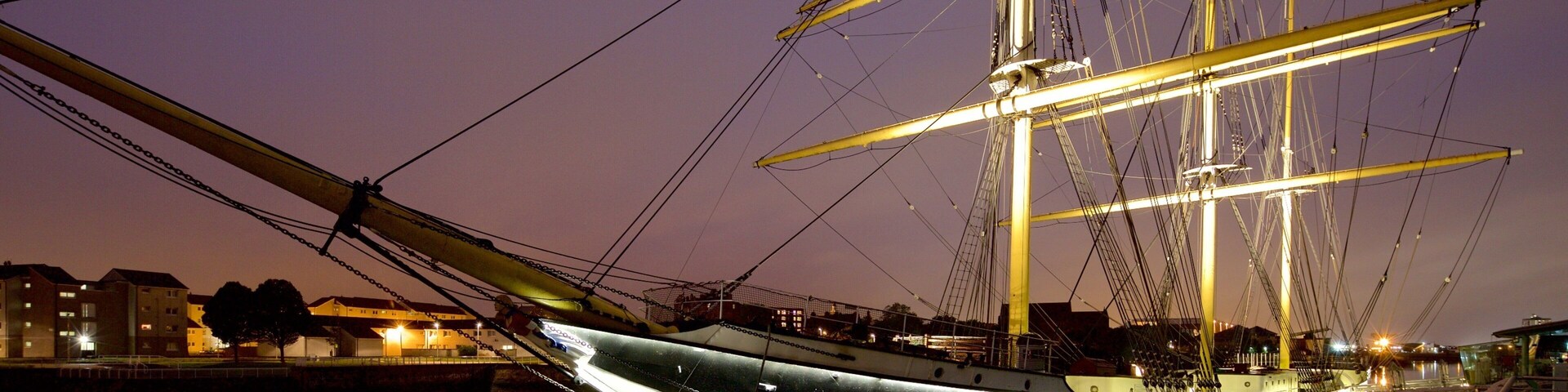 Tall Ship at Glasgow Harbour showing boating and a sunset