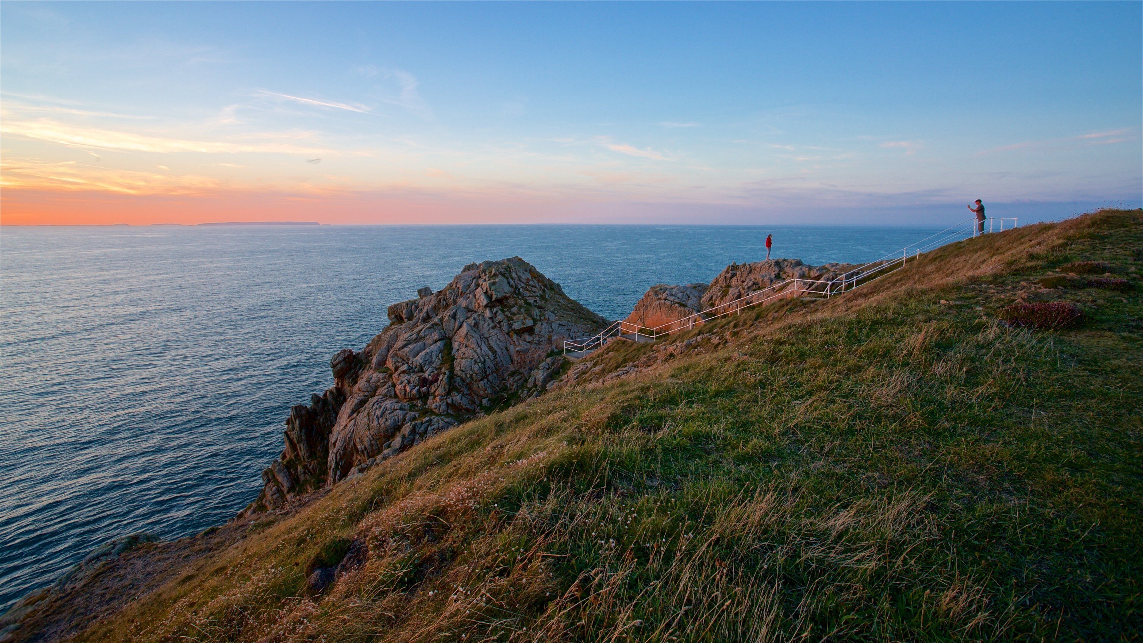 Grosnez Castle featuring a sunset, landscape views and general coastal views