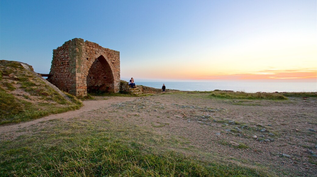 Grosnez Castle which includes landscape views, building ruins and general coastal views