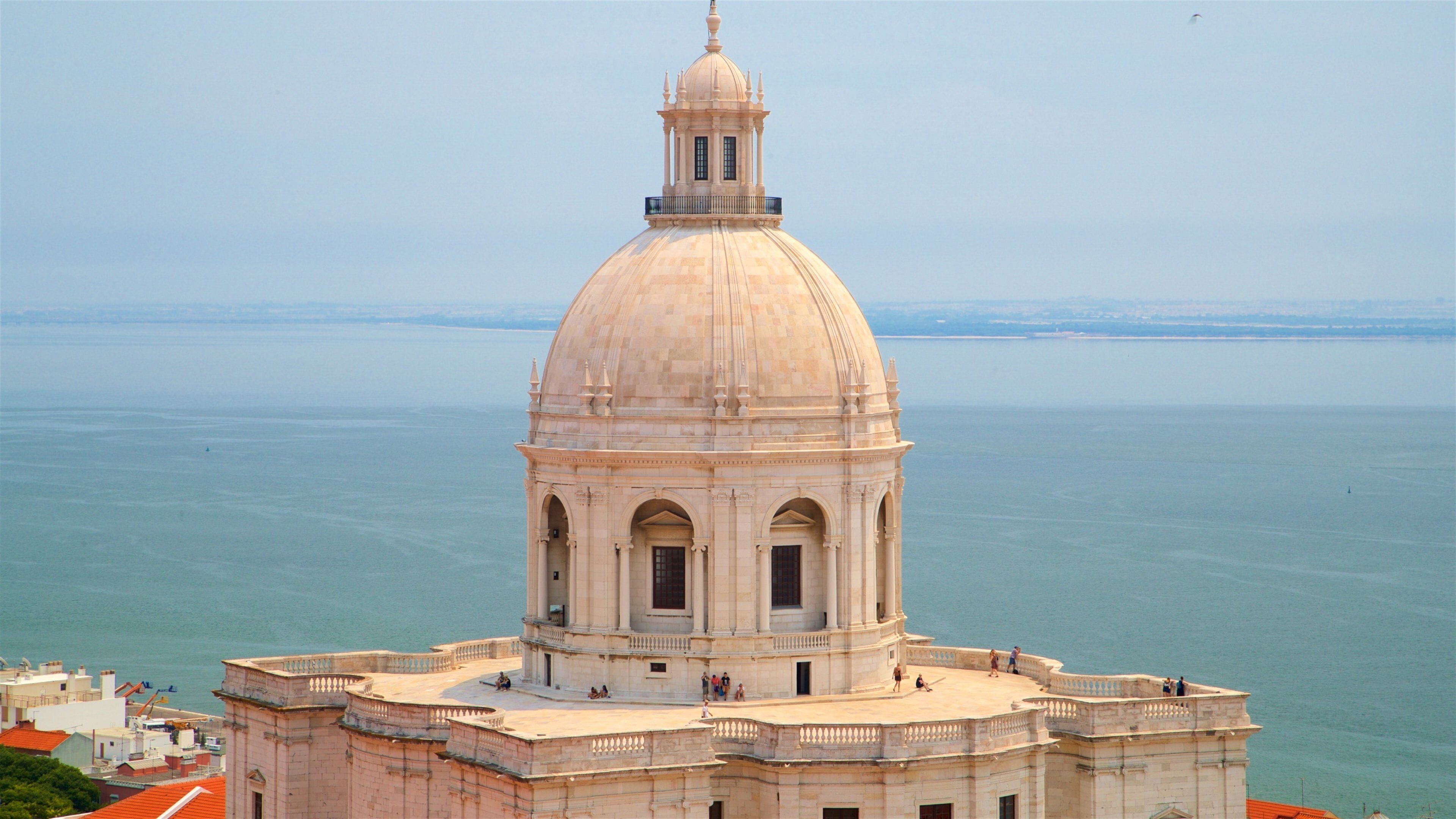 Monastery of Sao Vicente de Fora featuring heritage architecture, general coastal views and a coastal town