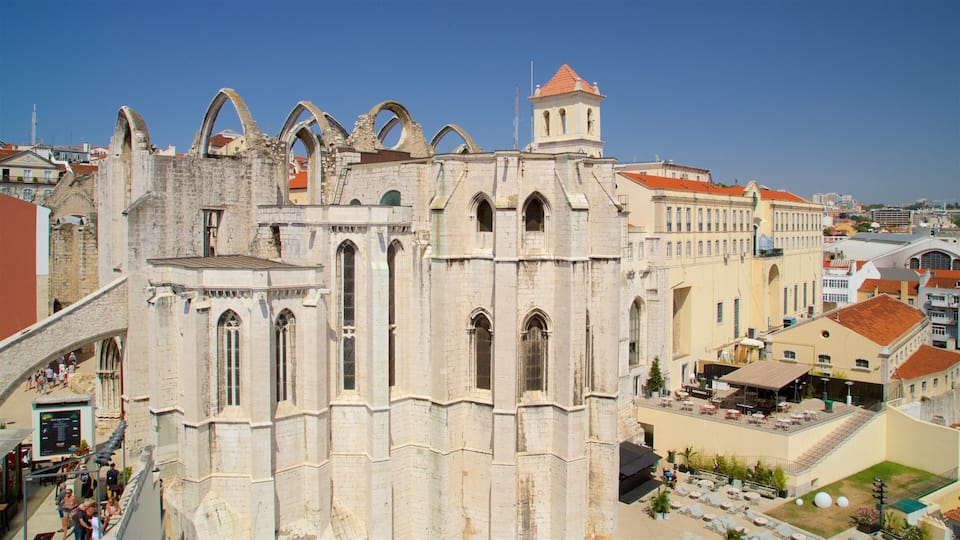 An old cathedral with arched windows and a bell tower.