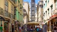 Santa Justa Elevator featuring a city, markets and heritage architecture