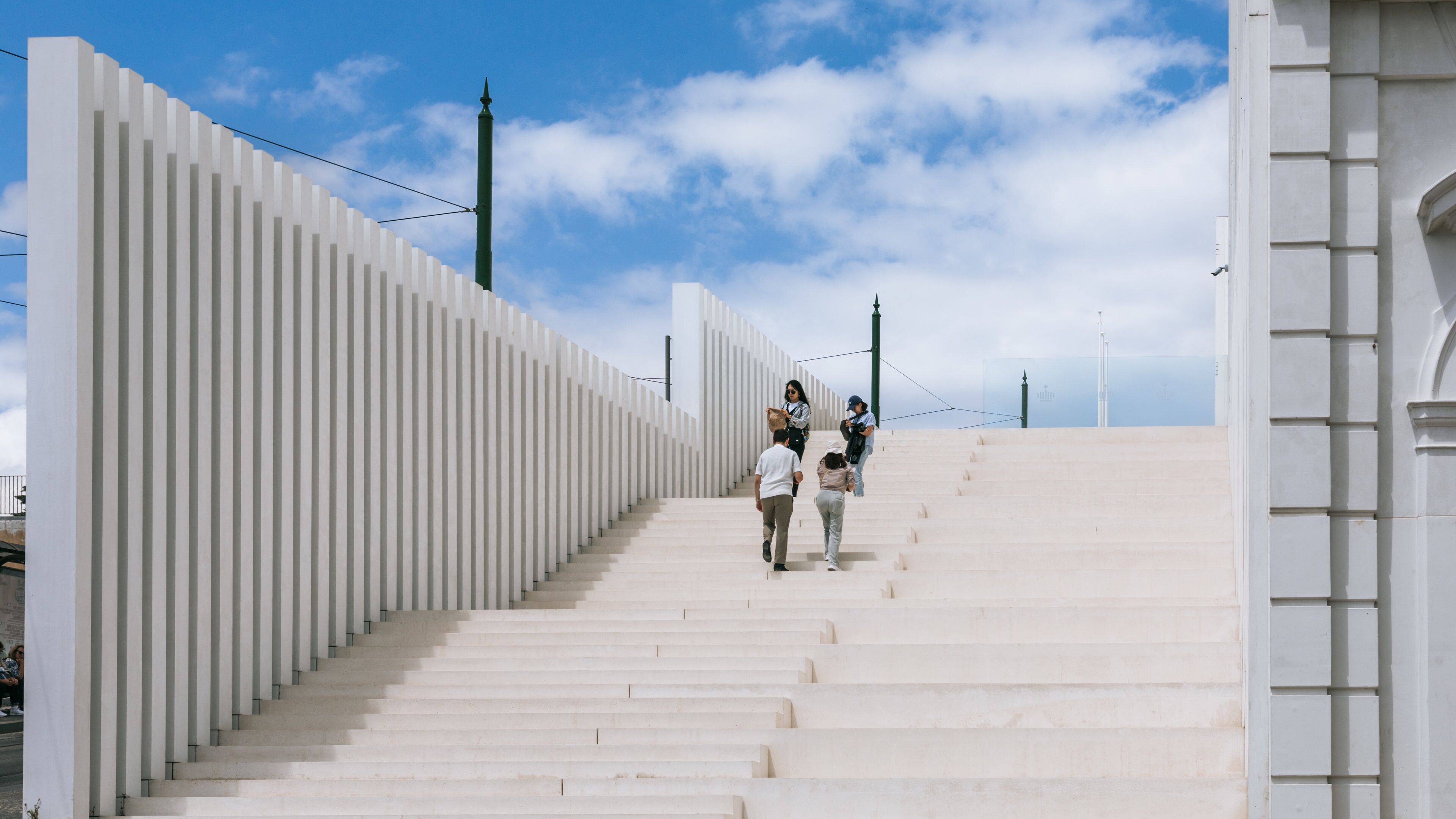 Ajuda National Palace showing street scenes as well as a couple