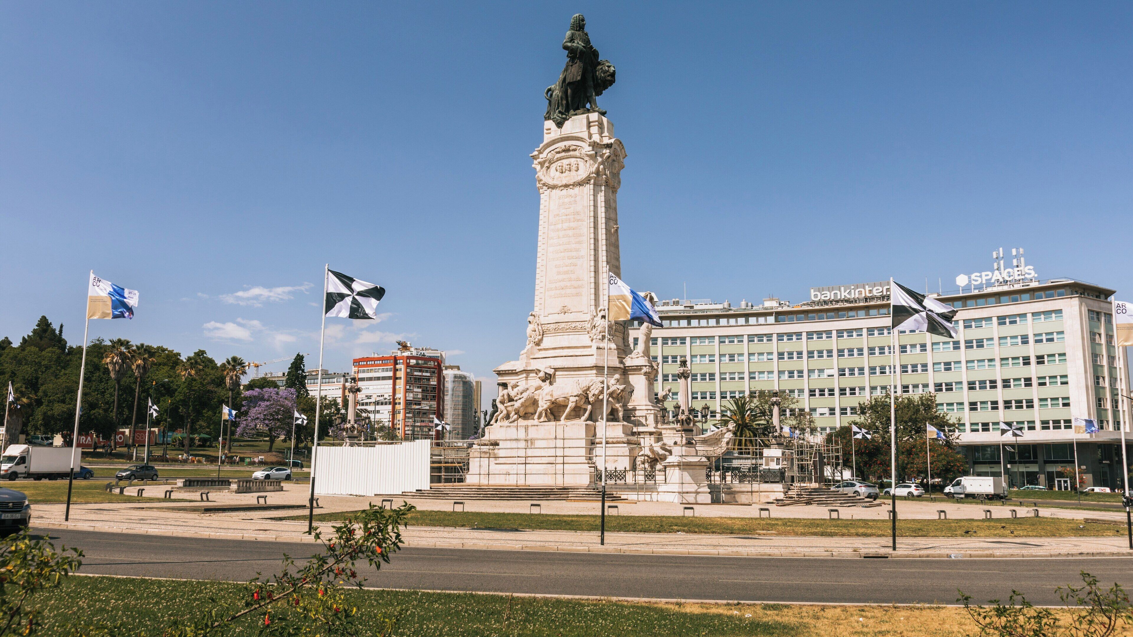 Exploring Marquis of Pombal Square in the Heart of Lisbon, Portugal with Historic Monument and Vibrant City Life